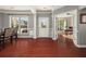 Bright dining room with hardwood floors, natural light, and adjacent office space at 2881 Terra View Sw Dr, Lilburn, GA 30047