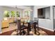 Cozy eat-in area with views of the bright living room and backyard at 2881 Terra View Sw Dr, Lilburn, GA 30047