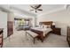 Large main bedroom with a seating area and a king-sized bed at 2881 Terra View Sw Dr, Lilburn, GA 30047