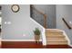 Staircase with carpeted steps and hardwood railings, adding charm to the home's interior at 2881 Terra View Sw Dr, Lilburn, GA 30047