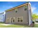Home exterior featuring a patio area with a small yard at 3314 Tiara Cir, Atlanta, GA 30311
