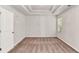 A bedroom featuring a trey ceiling, carpet and a window at 3314 Tiara Cir, Atlanta, GA 30311