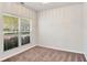 Bright room with neutral carpet, a large window, and neutral paint, ready for your personal touch at 3314 Tiara Cir, Atlanta, GA 30311