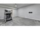 Finished basement area featuring neutral carpeting, offering a versatile space for recreation or relaxation at 4349 Northmark Ln, Buford, GA 30518