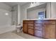 Bathroom with a large vanity, dual sinks, a shower-tub combo, and tile flooring at 4349 Northmark Ln, Buford, GA 30518