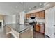 Gourmet kitchen featuring an island, granite countertops, and stainless steel appliances at 4349 Northmark Ln, Buford, GA 30518