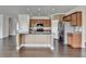 Spacious kitchen with stainless steel appliances, granite countertops, and ample cabinet space at 4349 Northmark Ln, Buford, GA 30518