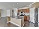 Well-equipped kitchen with granite counters, stainless appliances, and center island at 4349 Northmark Ln, Buford, GA 30518