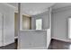 View of living area with large windows and access to a balcony at 4349 Northmark Ln, Buford, GA 30518