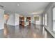 Expansive living space with hardwood floors, kitchen access, and lots of natural light at 4349 Northmark Ln, Buford, GA 30518