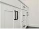Bathroom cabinet featuring black hardware and white cabinets at 440 Carrera Ln, Acworth, GA 30102