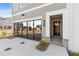 Inviting front entrance with black door and modern design elements at 440 Carrera Ln, Acworth, GA 30102