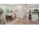 Open dining area with stylish decor, seamlessly connecting to the kitchen and living spaces at 531 Roy Sw St, Atlanta, GA 30310