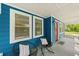 Cozy front porch featuring comfortable seating, perfect for enjoying the neighborhood views at 531 Roy Sw St, Atlanta, GA 30310