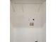 Utility room with washer/dryer hookups and storage shelves at 531 Roy Sw St, Atlanta, GA 30310