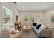 Cozy living room featuring stylish furniture and large windows at 531 Roy Sw St, Atlanta, GA 30310