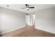Bright bedroom with hardwood floors and ceiling fan at 131 Magazine St, Dallas, GA 30157