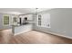 Bright kitchen with stainless appliances, an island, and plenty of natural light at 131 Magazine St, Dallas, GA 30157