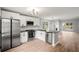 Open concept kitchen with stainless steel appliances, ample counter space, and modern cabinetry at 131 Magazine St, Dallas, GA 30157