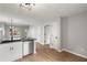 Modern kitchen with stainless steel dishwasher, ample counter space, open to living spaces at 131 Magazine St, Dallas, GA 30157