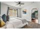 Bright bedroom with a view to the in-home gym, featuring neutral colors and natural light at 2537 Thompson Ne Rd, Brookhaven, GA 30319