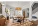 Stylish dining room with hardwood floors, modern lighting, and a bright and airy feel at 2537 Thompson Ne Rd, Brookhaven, GA 30319
