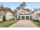 Lovely home with inviting curb appeal, including a well-maintained lawn and landscaping at 2537 Thompson Ne Rd, Brookhaven, GA 30319