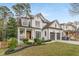 Beautiful home with manicured lawn, welcoming front porch, and two-car garage at 2537 Thompson Ne Rd, Brookhaven, GA 30319