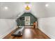Spacious home gym with a treadmill, weights, and large windows for natural light at 2537 Thompson Ne Rd, Brookhaven, GA 30319