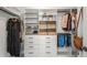 Organized walk-in closet with clothing racks, shelving and ample storage space at 2537 Thompson Ne Rd, Brookhaven, GA 30319