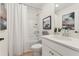 Bathroom featuring a modern vanity, framed art, and a tub-shower combo at 432 Carrera Ln, Acworth, GA 30102
