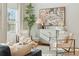 Cozy living room featuring modern furniture, stylish decor, and plenty of natural light at 432 Carrera Ln, Acworth, GA 30102