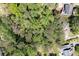 An aerial view shows a wooded lot, perfect for building a custom home surrounded by nature at 4140 Westchester Ne Xing, Roswell, GA 30075
