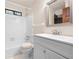 Clean bathroom with a white sink vanity and tub with shower at 4140 Westchester Ne Xing, Roswell, GA 30075