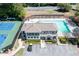 A community clubhouse with a pool and tennis courts offers resort-style amenities at 4140 Westchester Ne Xing, Roswell, GA 30075
