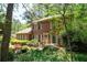Charming red brick two-story home with shutters and lush landscaping at 4140 Westchester Ne Xing, Roswell, GA 30075