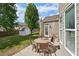 Large backyard featuring a shed, patio, and room for outdoor activities and entertaining at 5450 Fieldfreen Dr, Cumming, GA 30028