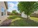 A backyard with a storage shed, fire pit, and privacy fence at 5450 Fieldfreen Dr, Cumming, GA 30028