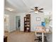 Bright upstairs landing with access to bathroom, study area, and natural light at 5450 Fieldfreen Dr, Cumming, GA 30028