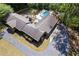 Aerial view of sprawling home with long driveway and beautifully landscaped grounds at 629 Concord Sw Rd, Smyrna, GA 30082