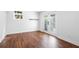 Finished basement with walkout double doors, wood look floors, and neutral color palette at 629 Concord Sw Rd, Smyrna, GA 30082