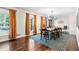 Spacious dining room featuring hardwood floors, modern lighting, ample natural light, and modern decor at 629 Concord Sw Rd, Smyrna, GA 30082