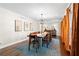 Bright dining room with hardwood floors, modern chandelier, and stylish decor at 629 Concord Sw Rd, Smyrna, GA 30082