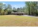 Sprawling one-story home with three-car garage, complemented by large front yard at 629 Concord Sw Rd, Smyrna, GA 30082