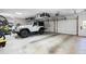 Spacious garage featuring ample storage, an overhead rack, and room for multiple vehicles and bikes at 629 Concord Sw Rd, Smyrna, GA 30082