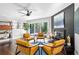Cozy living room with hardwood floors, mid-century modern furniture, and a tiled fireplace at 629 Concord Sw Rd, Smyrna, GA 30082