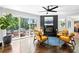 Bright living room showcasing hardwood floors, a fireplace, and glass sliding doors to the outdoor patio at 629 Concord Sw Rd, Smyrna, GA 30082