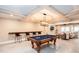 Finished basement area with a pool table, a wet bar, a seating area with a couch, and recessed lighting at 1000 Holly St, Canton, GA 30114