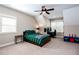 Inviting bedroom with a cozy bed, desk, and a view of the window at 1000 Holly St, Canton, GA 30114