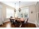 Charming dining room with natural light and modern light fixtures at 1000 Holly St, Canton, GA 30114
